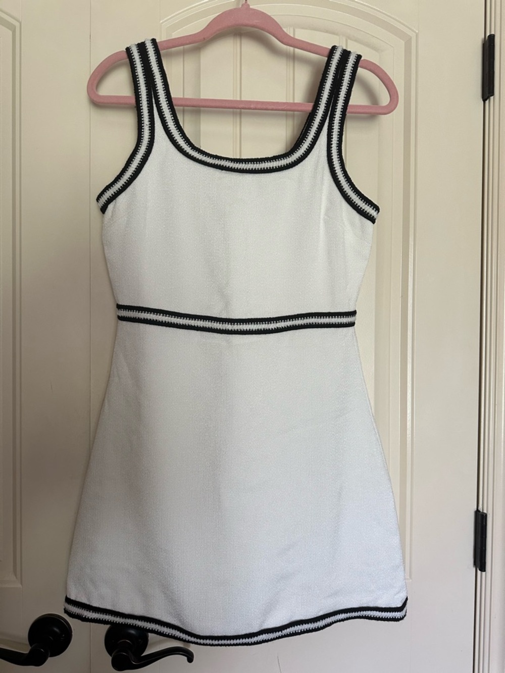 Sleeveless White Mini Dress with Black Trim